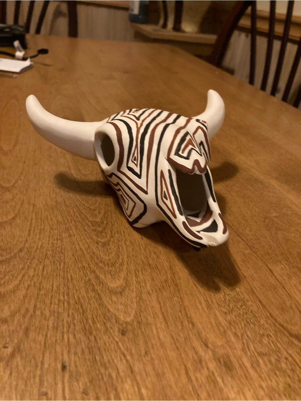 Native American pottery of bull skull
